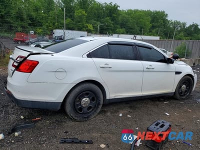 Trzecie zdjęcie samochodu z tyłu: 2014 FORD TAURUS POLICE INTERCEPTOR VIN:1FAHP2MKXEG180291 - miniatura