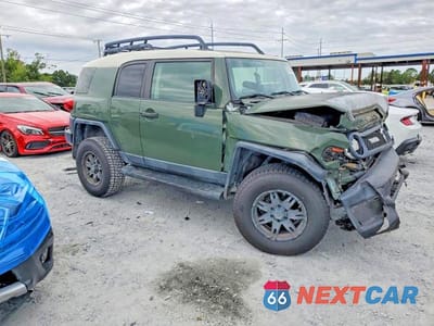 Czwarte zdjęcie samochodu z boku: 2010 TOYOTA FJ CRUISER BASE VIN:JTEBU4BF1AK075426 - miniatura