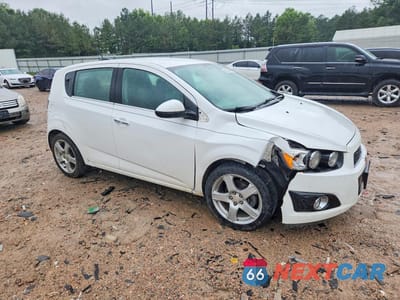 Czwarte zdjęcie samochodu z boku: 2015 CHEVROLET SONIC LTZ VIN:1G1JE6SB5F4212040 - miniatura