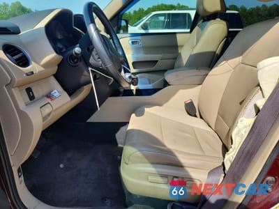 Zdjęcie 7 z 13 samochodu: 2012 HONDA PILOT EXL VIN:5FNYF4H5XCB027530 - miniatura