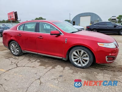 Czwarte zdjęcie samochodu z boku: 2012 LINCOLN MKS VIN:1LNHL9DR9CG807079 - miniatura