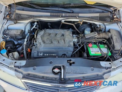 Zdjęcie 12 z 13 samochodu: 2001 HONDA ODYSSEY VIN:2HKRL18741H563255 - miniatura