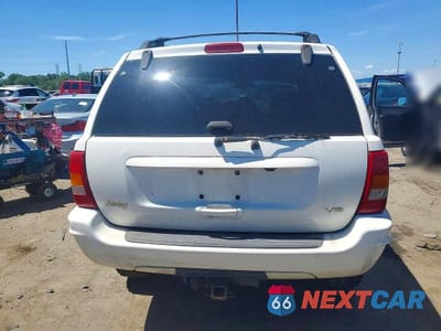 Zdjęcie 6 z 13 samochodu: 1999 JEEP GRAND CHEROKEE LIMITED VIN:1J4GW68N5XC696289 - miniatura