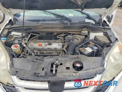 Zdjęcie 12 z 13 samochodu: 2010 HONDA CR-V EX VIN:3CZRE3H57AG701085 - miniatura
