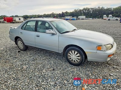 Czwarte zdjęcie samochodu z boku: 1995 TOYOTA CAMRY LE VIN:4T1SK12E7SU869171 - miniatura