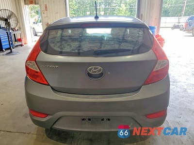 Zdjęcie 6 z 12 samochodu: 2014 HYUNDAI ACCENT GS VIN:KMHCT5AE0EU180846 - miniatura