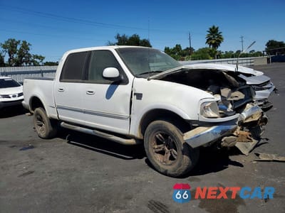 Czwarte zdjęcie samochodu z boku: 2002 FORD F150 SUPERCREW VIN:1FTRW08612KB17365 - miniatura