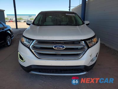 Piąte zdjęcie samochodu w środku: 2015 FORD EDGE TITANIUM VIN:2FMTK3K96FBB92354 - miniatura