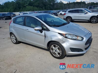 Czwarte zdjęcie samochodu z boku: 2014 FORD FIESTA SE VIN:3FADP4EJ3EM165265 - miniatura