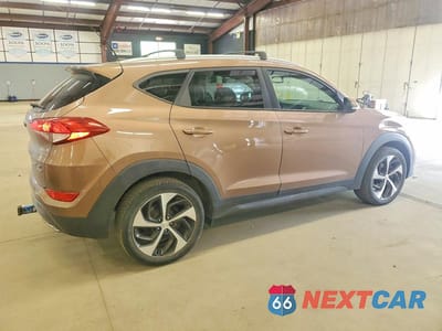 Trzecie zdjęcie samochodu z tyłu: 2016 HYUNDAI TUCSON VIN:KM8J3CA25GU111008 - miniatura