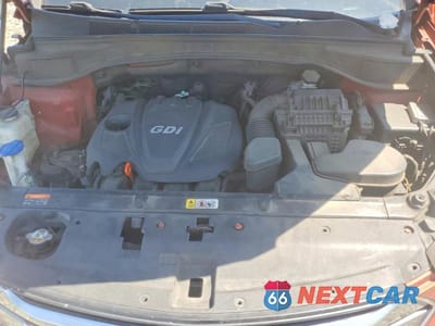Zdjęcie 12 z 13 samochodu: 2013 HYUNDAI SANTA FE SPORT 2.4L VIN:5XYZT3LB2DG013488 - miniatura