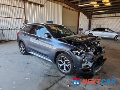 Czwarte zdjęcie samochodu z boku: 2018 BMW X1 VIN:WBXHT3C37J5F91908 - miniatura