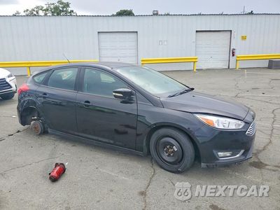 Czwarte zdjęcie samochodu z boku: 2017 FORD FOCUS SE VIN:1FADP3K24HL246434 - miniatura