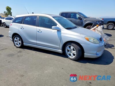 Czwarte zdjęcie samochodu z boku: 2006 TOYOTA COROLLA MATRIX XR VIN:2T1KR30EX6C593618 - miniatura