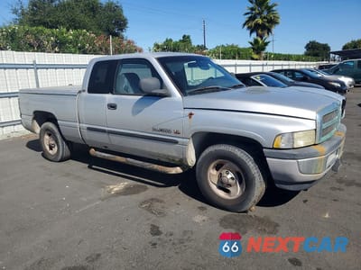 Czwarte zdjęcie samochodu z boku: 2001 DODGE RAM 1500 VIN:3B7HC13Y51G802381 - miniatura