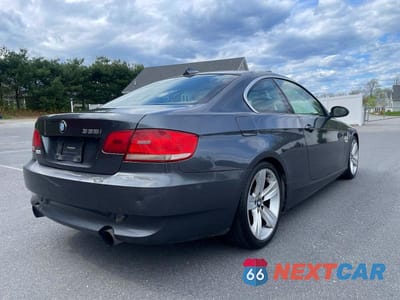 Czwarte zdjęcie samochodu z boku: 2007 BMW 335 I VIN:WBAWB73507P022115 - miniatura