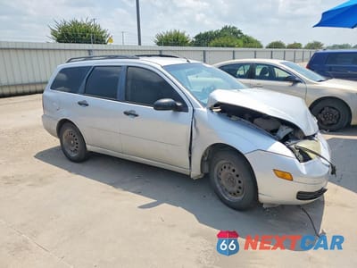 Czwarte zdjęcie samochodu z boku: 2005 FORD FOCUS ZXW VIN:1FAFP36N95W245948 - miniatura