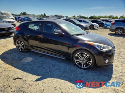 Czwarte zdjęcie samochodu z boku: 2016 HYUNDAI VELOSTER TURBO VIN:KMHTC6AE8GU292772 - miniatura