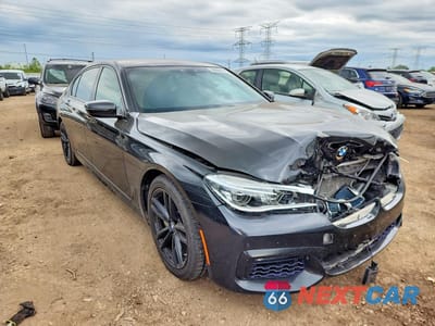 Czwarte zdjęcie samochodu z boku: 2018 BMW 750 XI VIN:WBA7F2C57JG423678 - miniatura