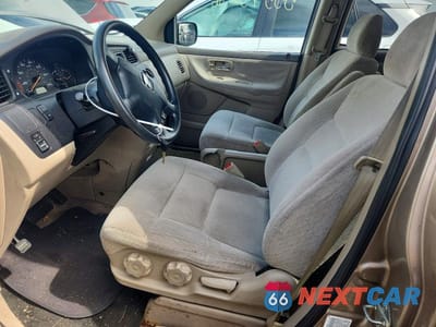 Zdjęcie 7 z 12 samochodu: 2004 HONDA ODYSSEY LX VIN:5FNRL18574B016241 - miniatura