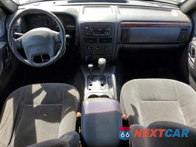 Zdjęcie 8 z 13 samochodu: 2000 JEEP GRAND CHEROKEE LAREDO VIN:1J4GW48S2YC308821 - miniatura