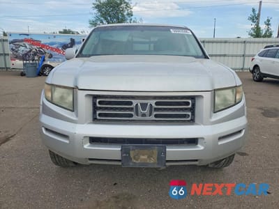Piąte zdjęcie samochodu w środku: 2006 HONDA RIDGELINE RTS VIN:2HJYK16416H571994 - miniatura