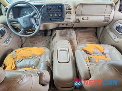 Zdjęcie 8 z 13 samochodu: 1999 CHEVROLET TAHOE C1500 VIN:1GNEC13R5XR150115 - miniatura