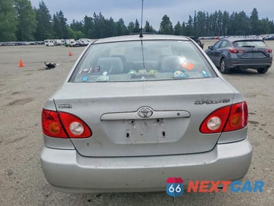 Zdjęcie 6 z 12 samochodu: 2003 TOYOTA COROLLA CE VIN:1NXBR32E73Z030565 - miniatura
