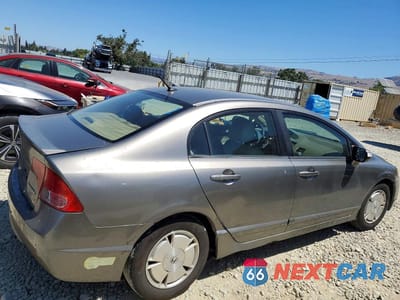 Trzecie zdjęcie samochodu z tyłu: 2006 HONDA CIVIC HYBRID VIN:JHMFA362X6S009625 - miniatura