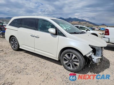 Czwarte zdjęcie samochodu z boku: 2016 HONDA ODYSSEY TOURING VIN:5FNRL5H9XGB060474 - miniatura