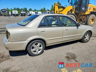 Trzecie zdjęcie samochodu z tyłu: 2002 MAZDA PROTEGE DX VIN:JM1BJ225420536706 - miniatura