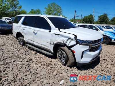 Czwarte zdjęcie samochodu z boku: 2022 CHEVROLET TAHOE K1500 LT VIN:1GNSKNKD3NR210151 - miniatura
