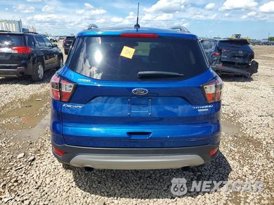 Zdjęcie 6 z 13 samochodu: 2017 FORD ESCAPE TITANIUM VIN:1FMCU0JD0HUE21770 - miniatura
