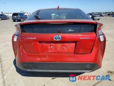 Zdjęcie 6 z 12 samochodu: 2018 TOYOTA PRIUS TWO VIN:JTDKBRFU8J3074588 - miniatura
