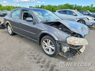 Czwarte zdjęcie samochodu z boku: 2002 NISSAN MAXIMA GXE VIN:JN1DA31A92T307176 - miniatura