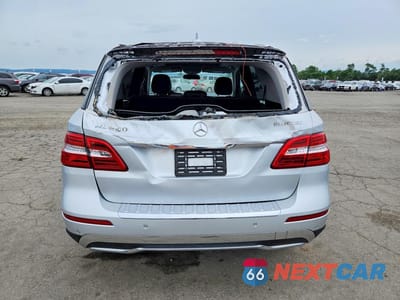 Zdjęcie 6 z 14 samochodu: 2015 MERCEDES-BENZ ML 250 BLUETEC VIN:4JGDA0EBXFA464937 - miniatura
