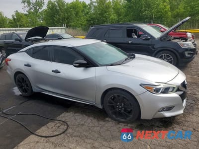 Czwarte zdjęcie samochodu z boku: 2018 NISSAN MAXIMA 3.5 SV VIN:1N4AA6AP0JC368006 - miniatura
