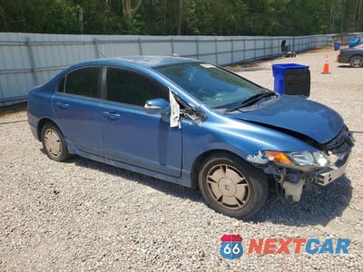 Czwarte zdjęcie samochodu z boku: 2010 HONDA CIVIC HYBRID VIN:JHMFA3F26AS002079 - miniatura