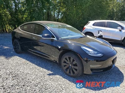 Czwarte zdjęcie samochodu z boku: 2018 TESLA MODEL 3 VIN:5YJ3E1EA6JF013912 - miniatura