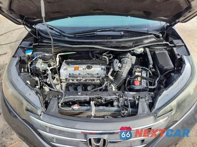 Zdjęcie 12 z 14 samochodu: 2014 HONDA CR-V LX VIN:3CZRM3H38EG707680 - miniatura