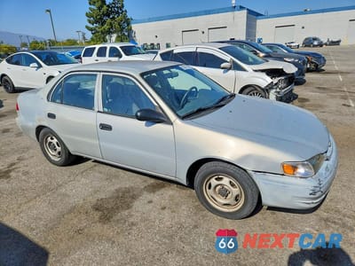 Czwarte zdjęcie samochodu z boku: 2000 TOYOTA COROLLA VE VIN:1NXBR12E7YZ356734 - miniatura