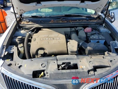 Zdjęcie 11 z 12 samochodu: 2016 LINCOLN MKS VIN:1LNHL9DKXGG602041 - miniatura