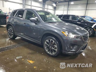 Czwarte zdjęcie samochodu z boku: 2016 MAZDA CX-5 GT VIN:JM3KE4DY4G0846263 - miniatura