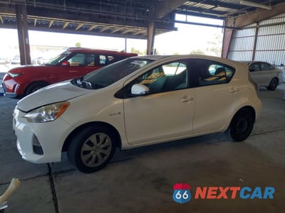 2014 TOYOTA PRIUS C ONE JTDKDTB37E1068545 - główne zdjęcie licytacji z USA - miniatura