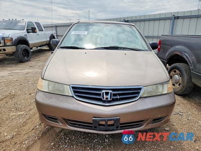Piąte zdjęcie samochodu w środku: 2004 HONDA ODYSSEY LX VIN:5FNRL18574B016241 - miniatura
