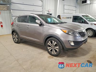 Czwarte zdjęcie samochodu z boku: 2011 KIA SPORTAGE EX VIN:KNDPC3A23B7155496 - miniatura