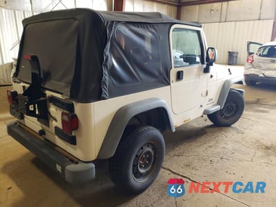 Trzecie zdjęcie samochodu z tyłu: 2004 JEEP WRANGLER VIN:1J4FA29104P787120 - miniatura