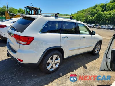 Trzecie zdjęcie samochodu z tyłu: 2011 JEEP GRAND CHEROKEE OVERLAND VIN:1J4RR6GT7BC684668 - miniatura