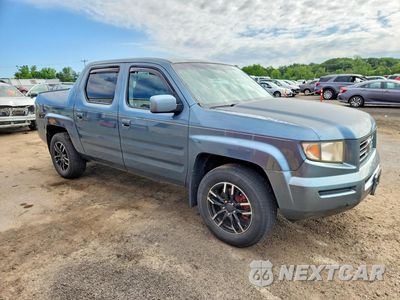 Czwarte zdjęcie samochodu z boku: 2006 HONDA RIDGELINE RTL VIN:2HJYK16586H517830 - miniatura