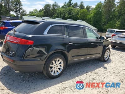 Trzecie zdjęcie samochodu z tyłu: 2015 LINCOLN MKT VIN:2LMHJ5NK7FBL01685 - miniatura
